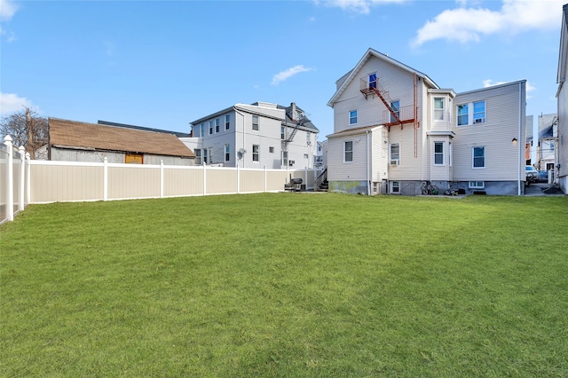 view of yard featuring fence