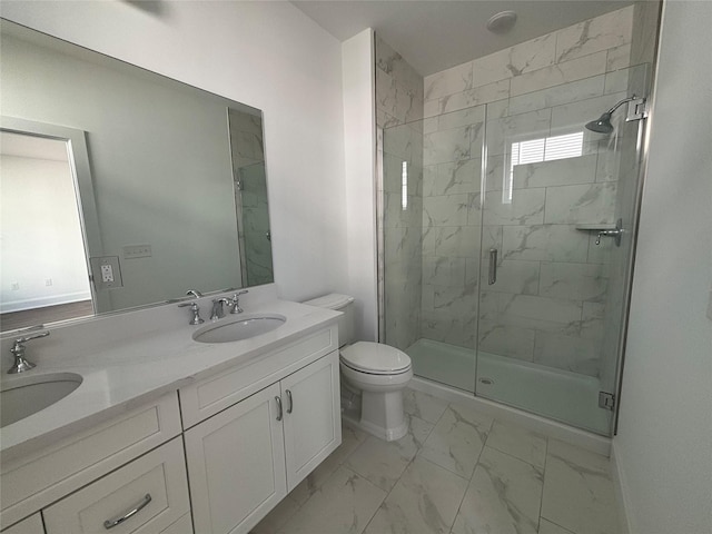 bathroom featuring a sink, toilet, marble finish floor, and a stall shower