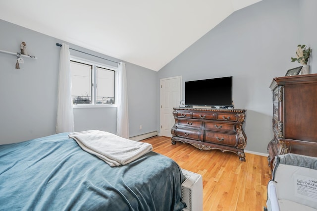 bedroom with lofted ceiling, light wood-type flooring, a baseboard radiator, and baseboards