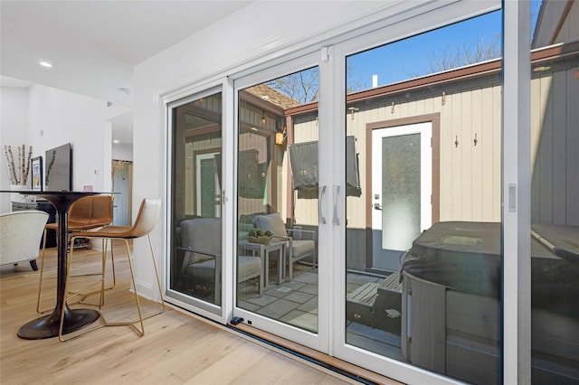 interior space featuring recessed lighting and wood finished floors