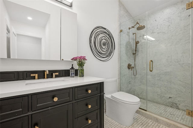 full bath featuring a shower stall, toilet, and vanity