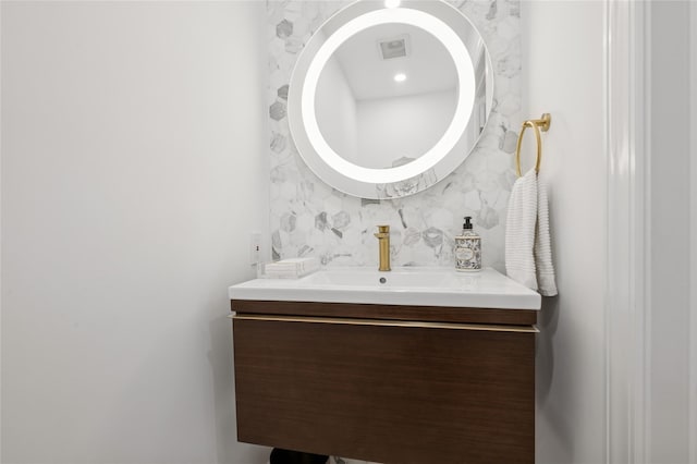 bathroom featuring visible vents and vanity