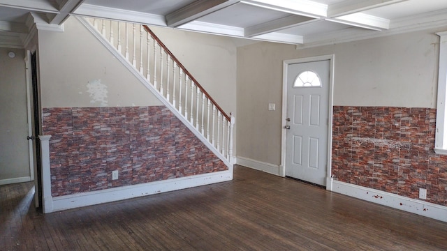 entryway with coffered ceiling, wood-type flooring, stairs, crown molding, and beam ceiling