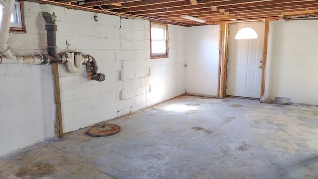 basement with concrete block wall