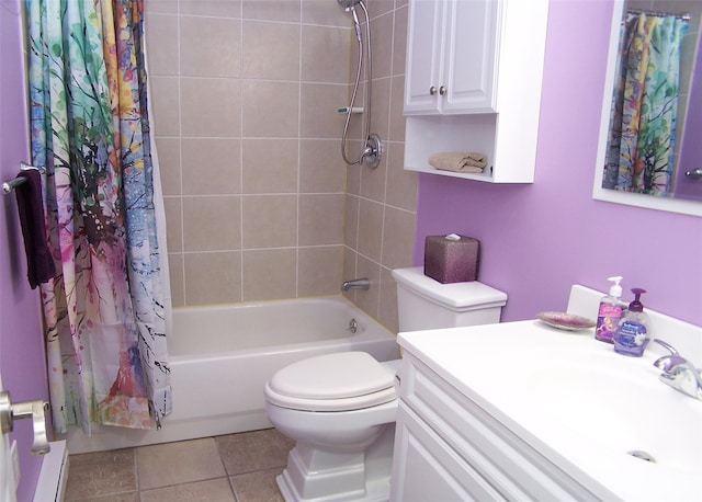 bathroom featuring tile patterned floors, vanity, toilet, and shower / bath combo with shower curtain