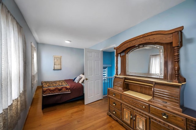 bedroom featuring light wood finished floors