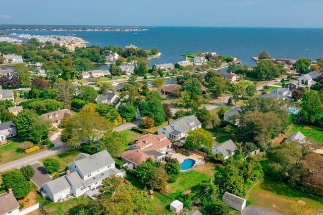 bird's eye view with a water view and a residential view