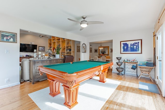 game room featuring light wood-style floors, a ceiling fan, and pool table