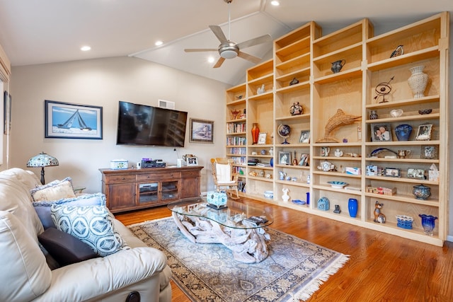 living room featuring ceiling fan, vaulted ceiling, wood finished floors, and recessed lighting