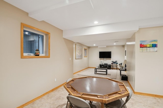 game room with baseboards and recessed lighting