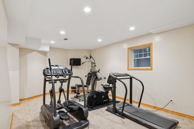 exercise area with recessed lighting, visible vents, and baseboards