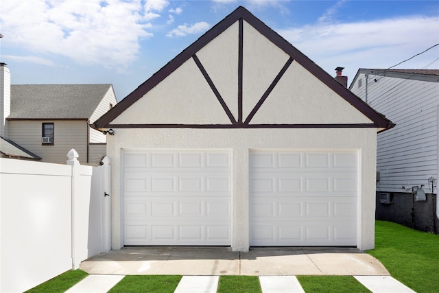 detached garage with fence