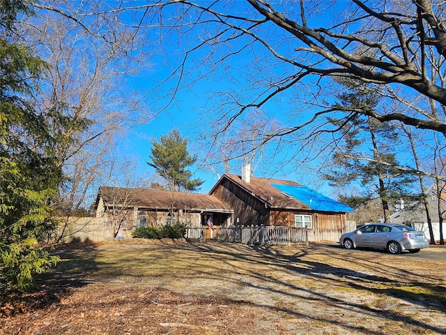 view of front of property featuring a chimney