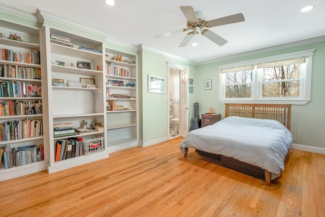 bedroom with crown molding, recessed lighting, wood finished floors, and baseboards