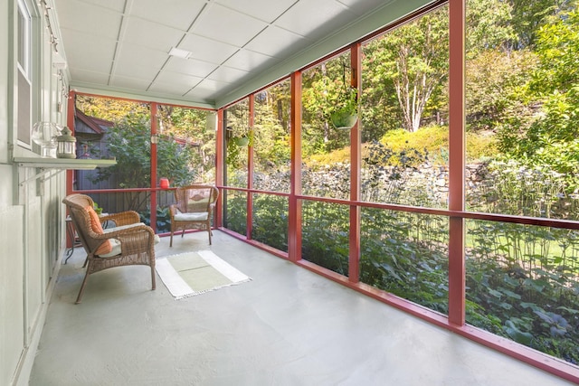 sunroom with a paneled ceiling