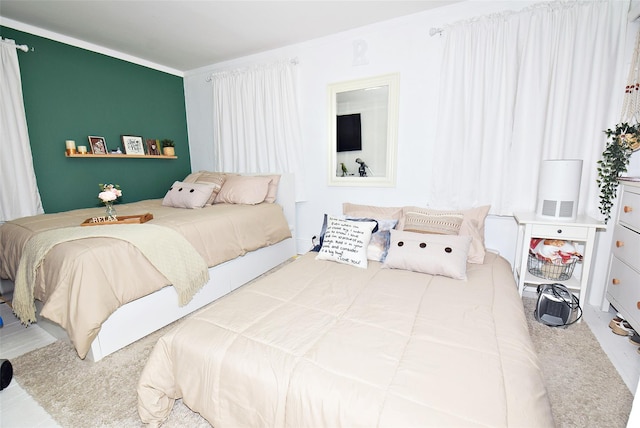 bedroom with ornamental molding