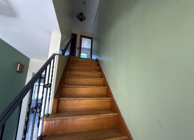 staircase with baseboards