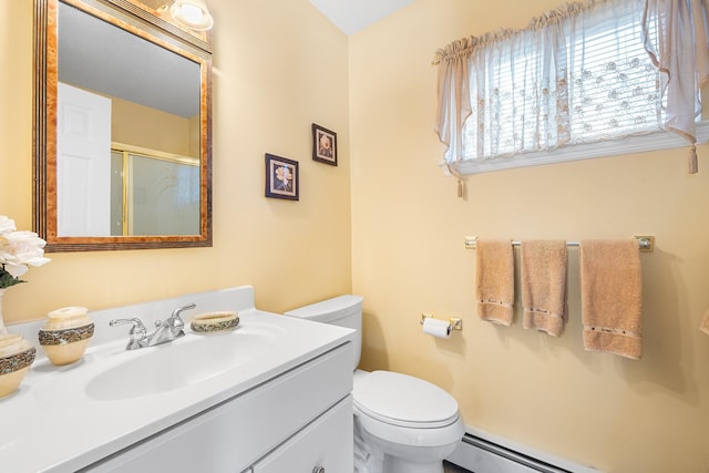 bathroom featuring toilet, a shower stall, a baseboard heating unit, and vanity