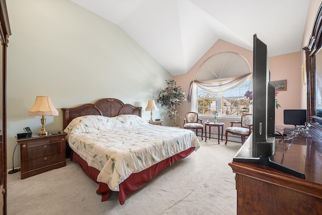 bedroom with vaulted ceiling, a baseboard heating unit, and light carpet