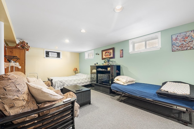 carpeted bedroom with recessed lighting