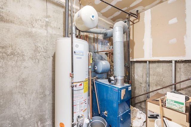 utility room featuring water heater