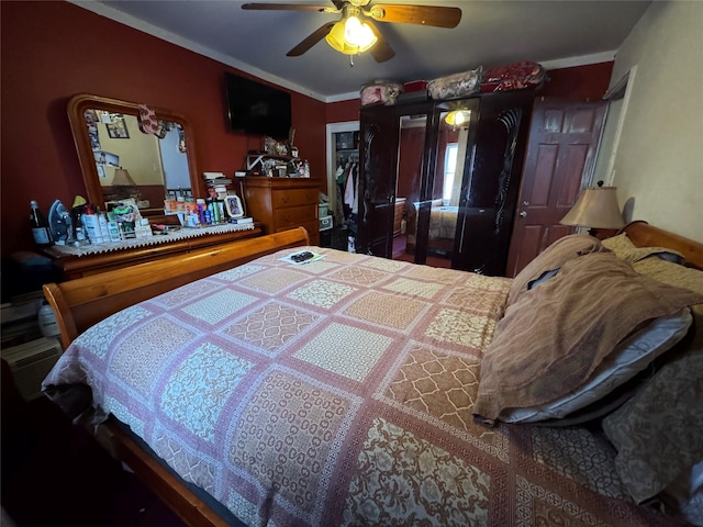 bedroom featuring crown molding and ceiling fan