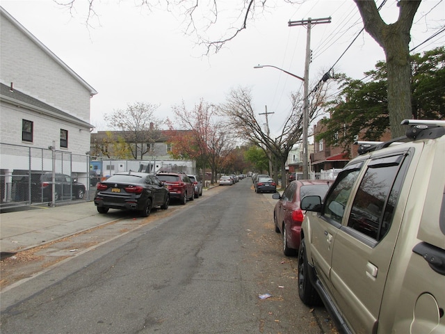 view of street with sidewalks and street lights