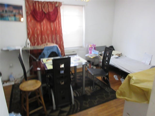 dining area with wood finished floors