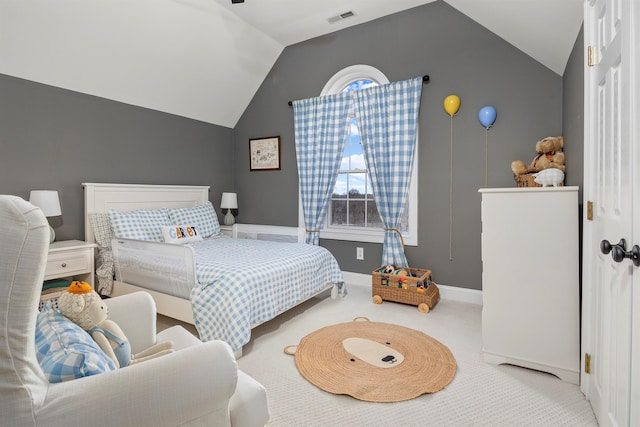 bedroom featuring lofted ceiling, baseboards, visible vents, and carpet floors