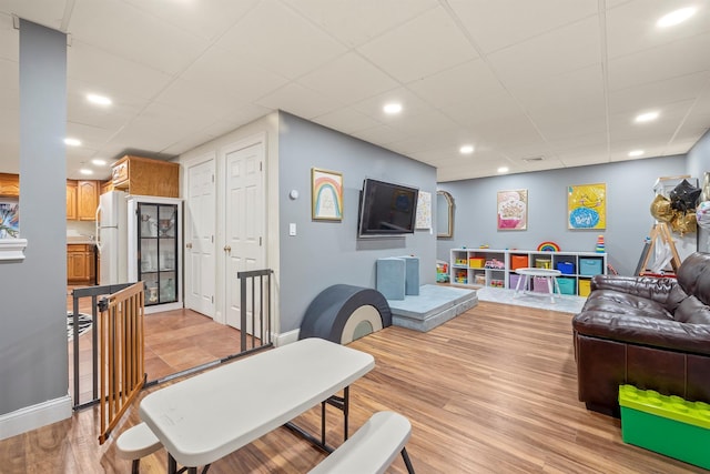 interior space featuring recessed lighting, baseboards, and light wood-type flooring