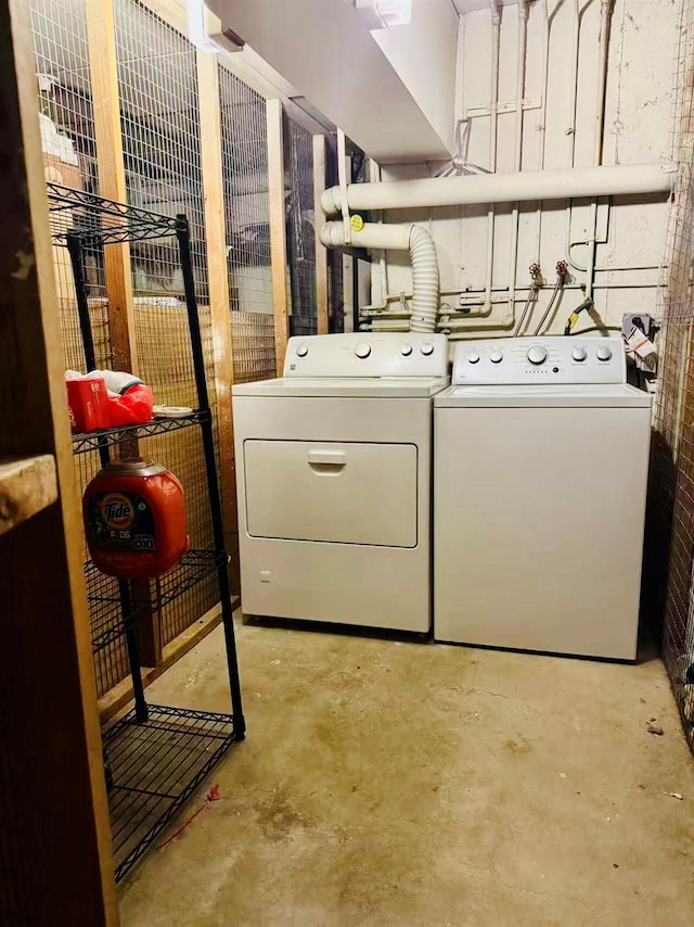 clothes washing area featuring laundry area and independent washer and dryer