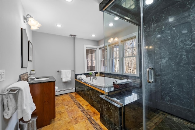 bathroom featuring visible vents, a garden tub, vanity, a shower stall, and a baseboard heating unit