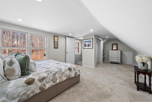 bedroom with lofted ceiling, carpet floors, baseboards, and recessed lighting