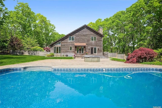 view of pool with a fenced backyard, a fenced in pool, and a patio