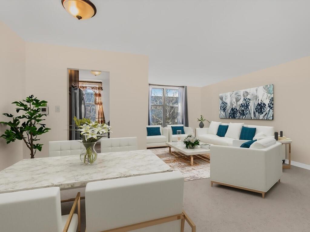 1480 Thieriot Ave Unit 6E, Bronx, NY 10460 - living room featuring baseboards
