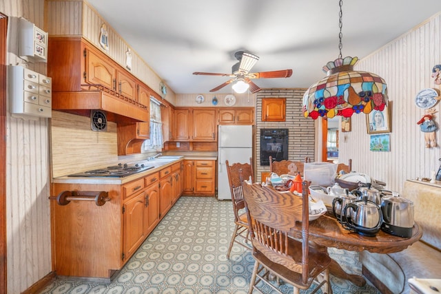 15744 97th St, Howard Beach, NY 11414 - kitchen with a ceiling fan, freestanding refrigerator, light countertops, stovetop, and light floors