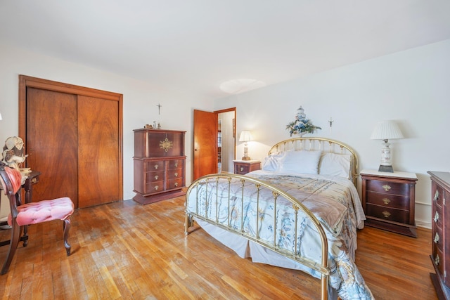 15744 97th St, Howard Beach, NY 11414 - bedroom with a closet and light wood finished floors