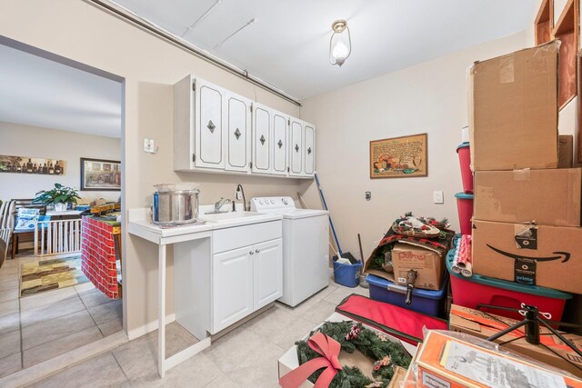 15744 97th St, Howard Beach, NY 11414 - washroom with cabinet space, light tile patterned floors, washer / clothes dryer, and a sink
