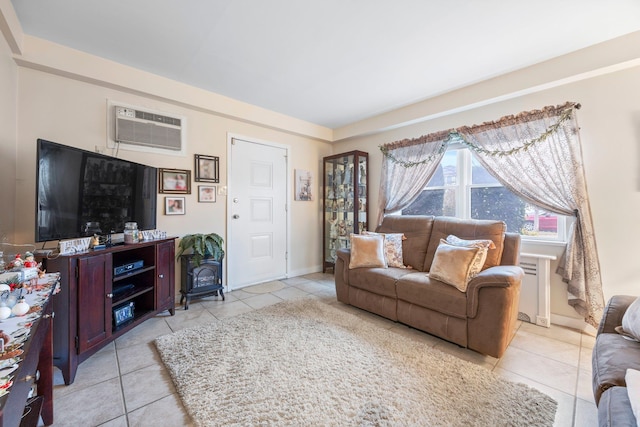 15744 97th St, Howard Beach, NY 11414 - living room with radiator, an AC wall unit, light tile patterned flooring, and baseboards
