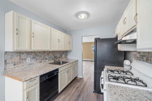 kitchen featuring white range with gas cooktop, dishwasher, backsplash, under cabinet range hood, and a sink