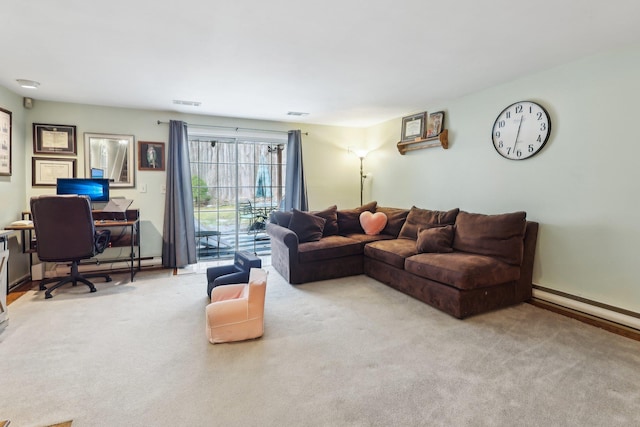 carpeted living area with visible vents