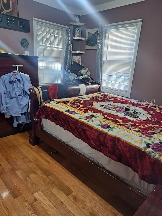 bedroom featuring hardwood / wood-style flooring