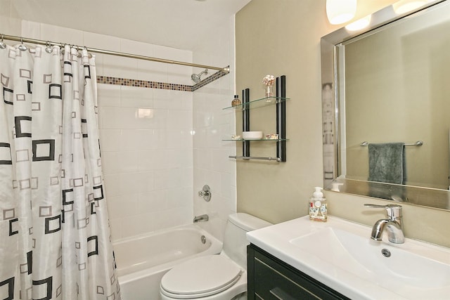 bathroom with vanity, shower / bath combo with shower curtain, and toilet