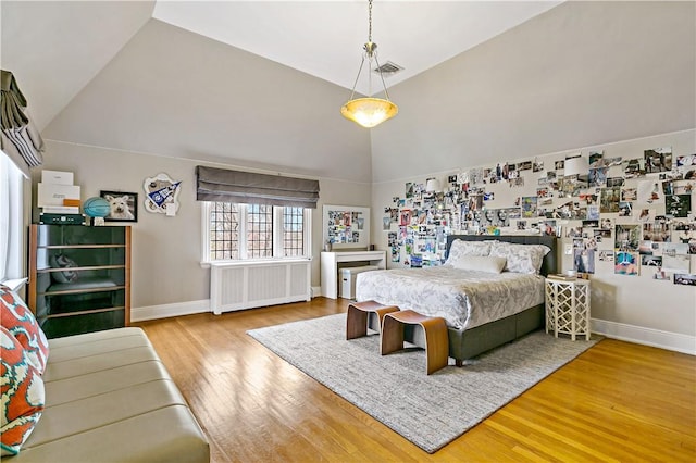 31 Old Army Rd, Scarsdale, NY 10583 - bedroom with visible vents, radiator heating unit, wood finished floors, and baseboards