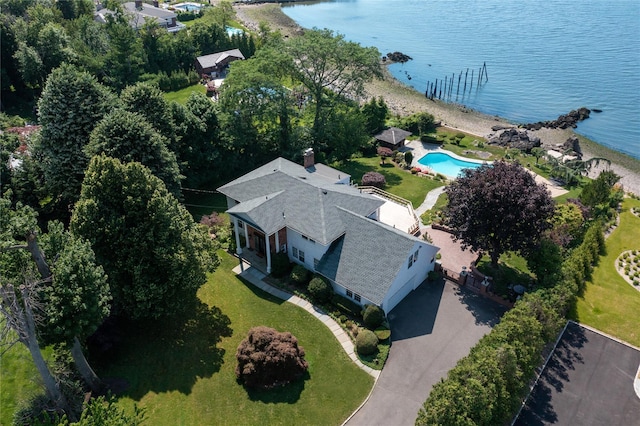 birds eye view of property with a water view