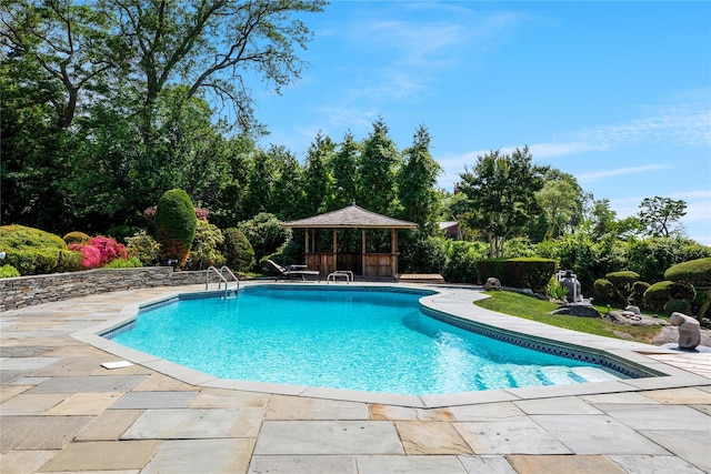 pool featuring a patio area and a gazebo