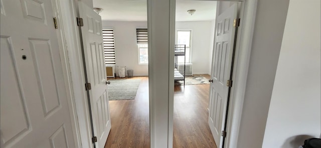 corridor with wood finished floors