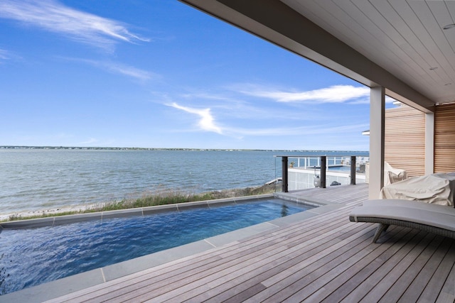 686 Dune Rd, Westhampton Dunes, NY 11978 - dock area with a water view and a balcony