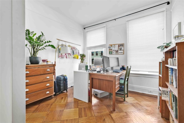 office area featuring baseboards