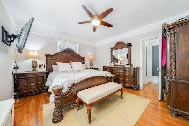 bedroom featuring a ceiling fan and wood finished floors